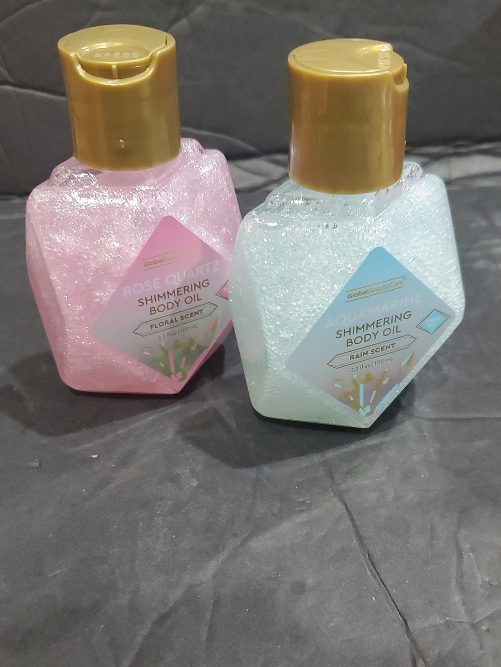 2pack pink rose quartz floral and aquamarine rain scented shimmery body oils new